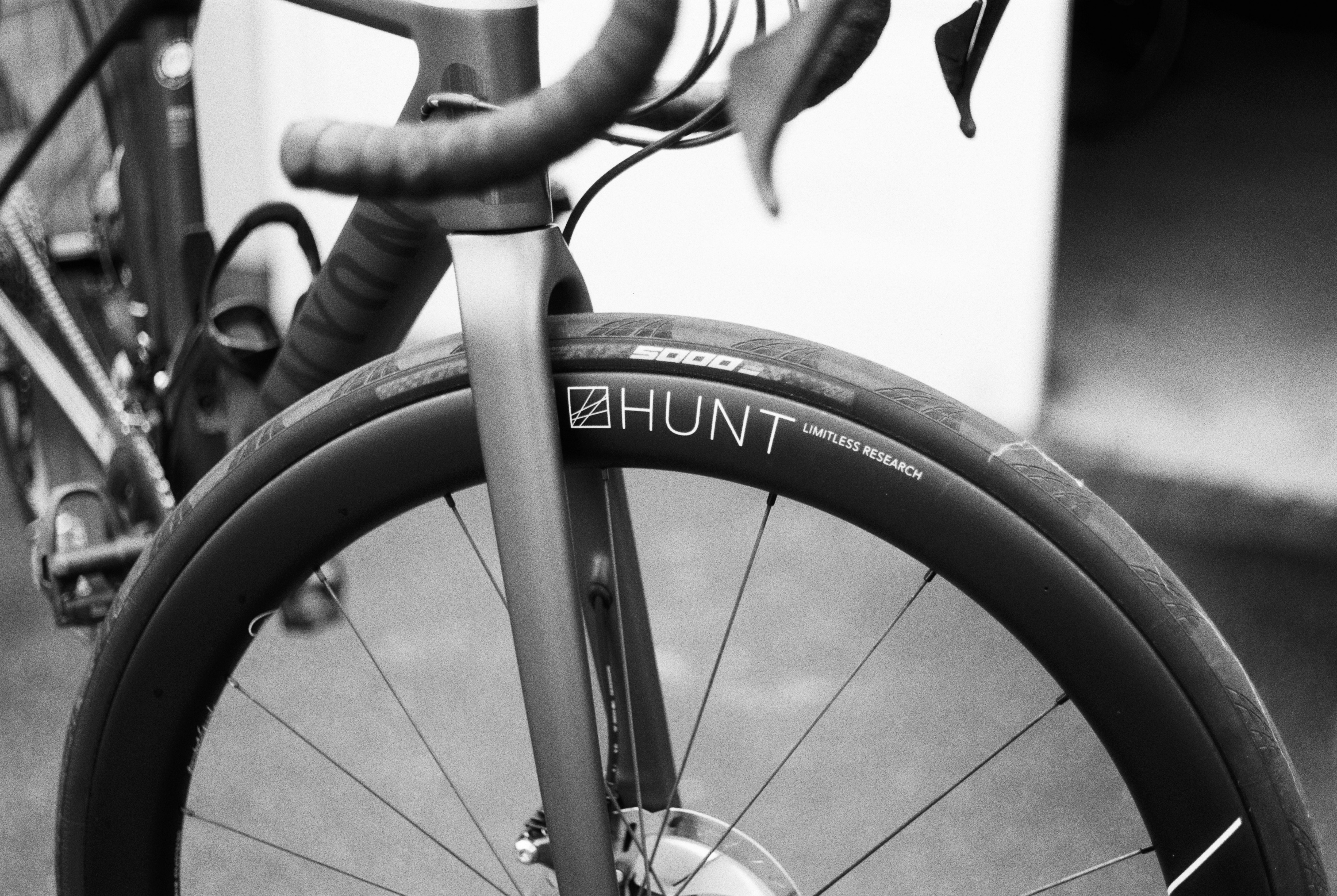 grayscale photo of bicycle wheel